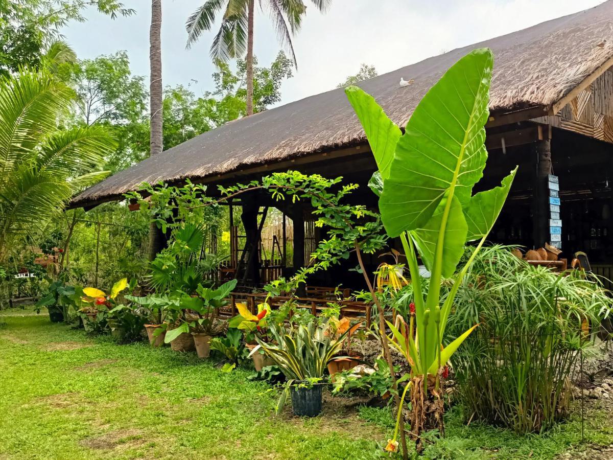 Hotel Archery-Asia Nipa Huts Moalboal Exterior foto