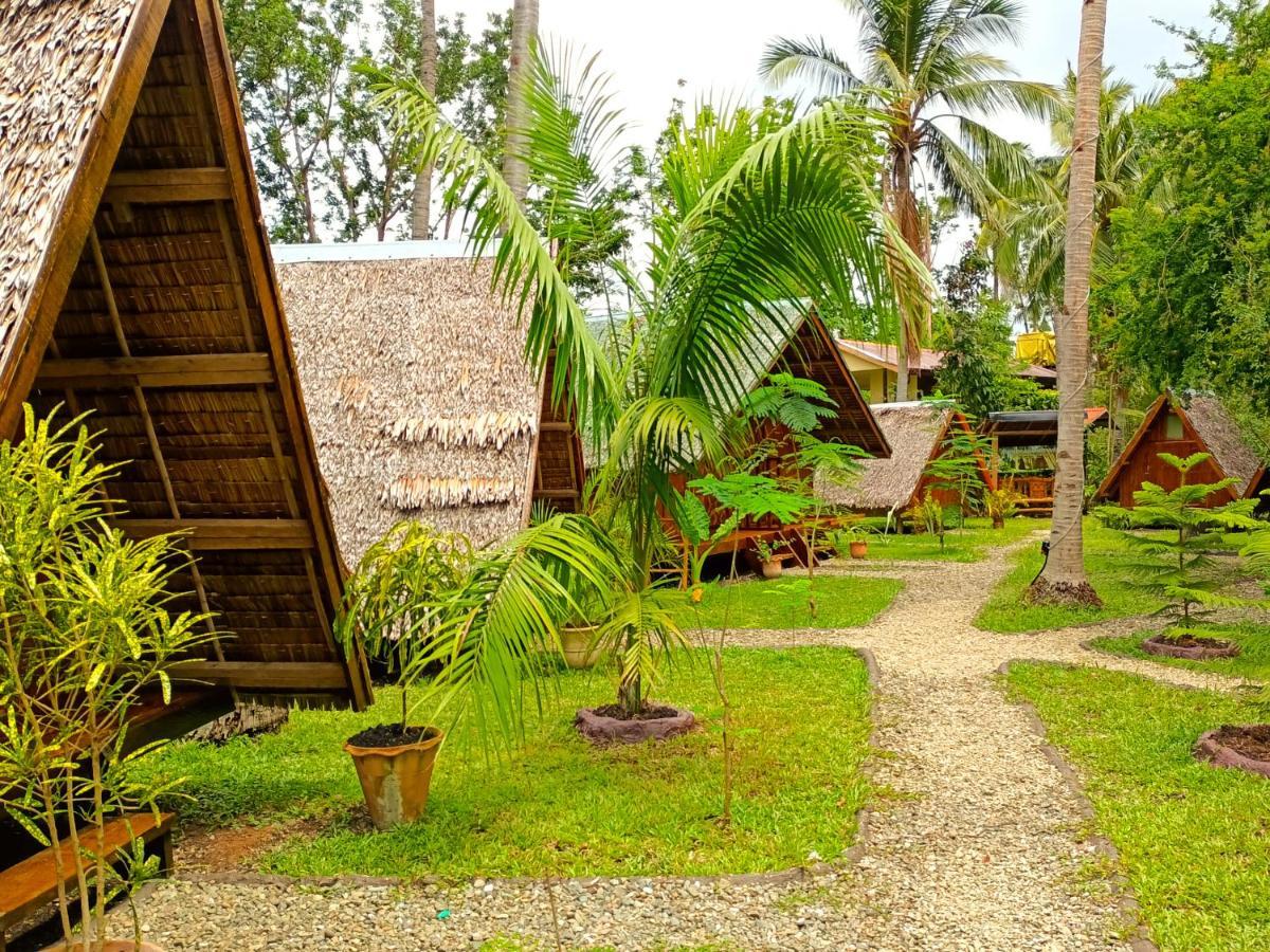 Hotel Archery-Asia Nipa Huts Moalboal Exterior foto