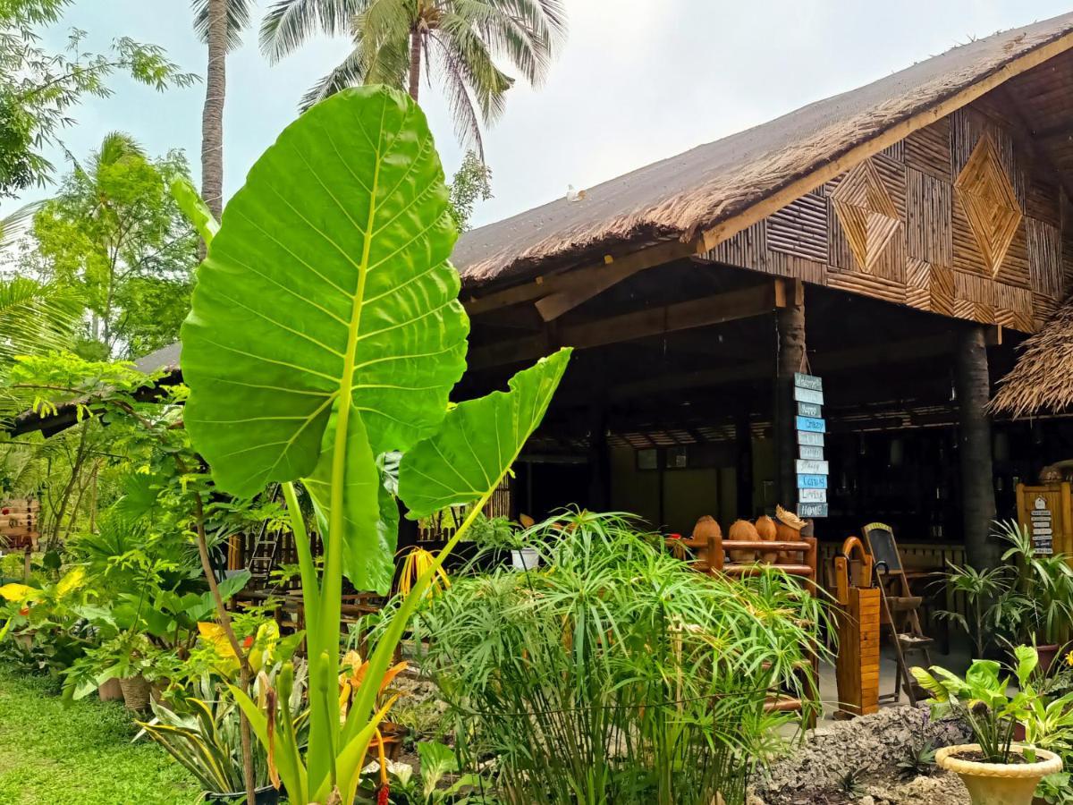 Hotel Archery-Asia Nipa Huts Moalboal Exterior foto