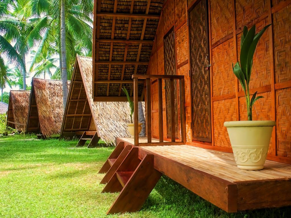 Hotel Archery-Asia Nipa Huts Moalboal Exterior foto