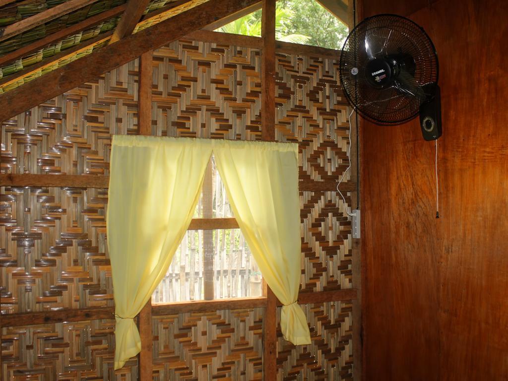 Hotel Archery-Asia Nipa Huts Moalboal Exterior foto