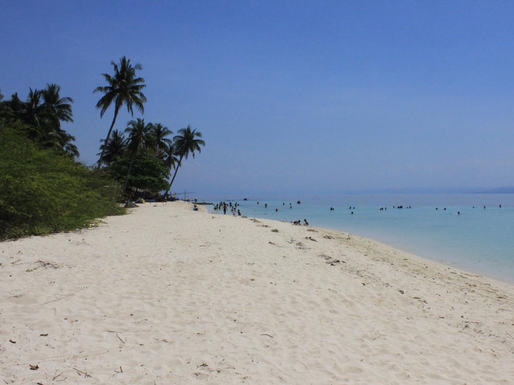 Hotel Archery-Asia Nipa Huts Moalboal Exterior foto