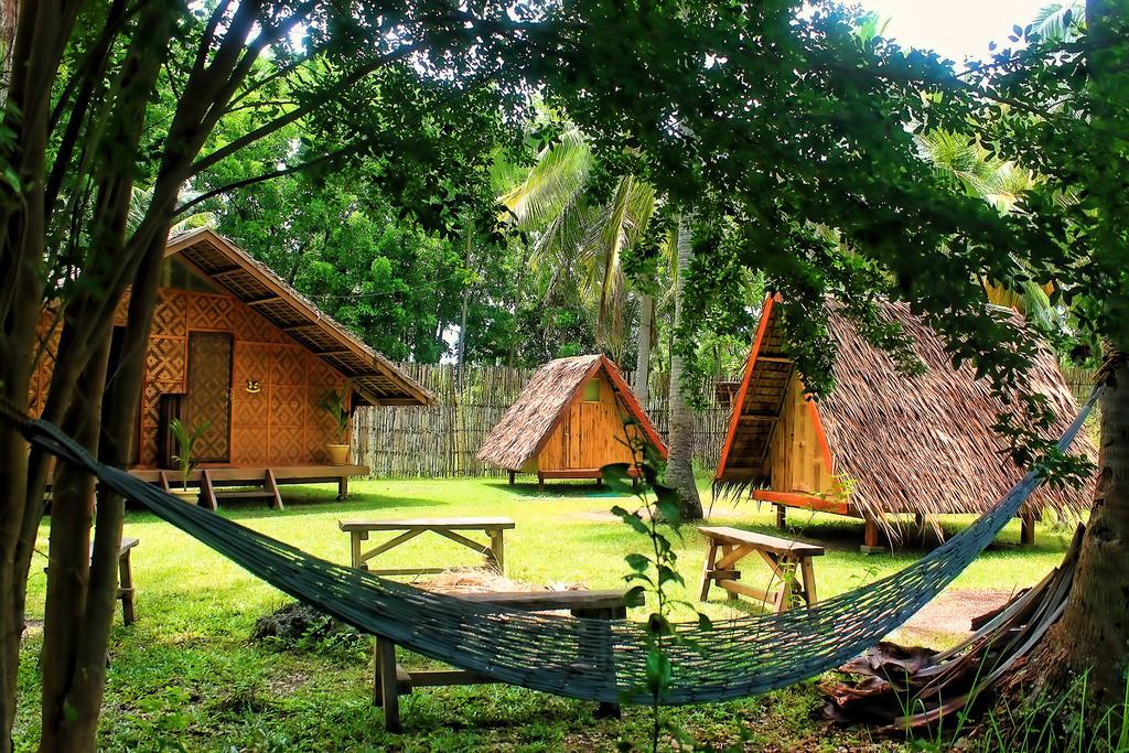 Hotel Archery-Asia Nipa Huts Moalboal Exterior foto