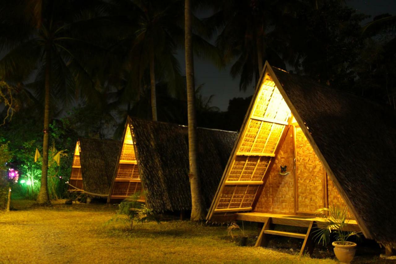 Hotel Archery-Asia Nipa Huts Moalboal Exterior foto