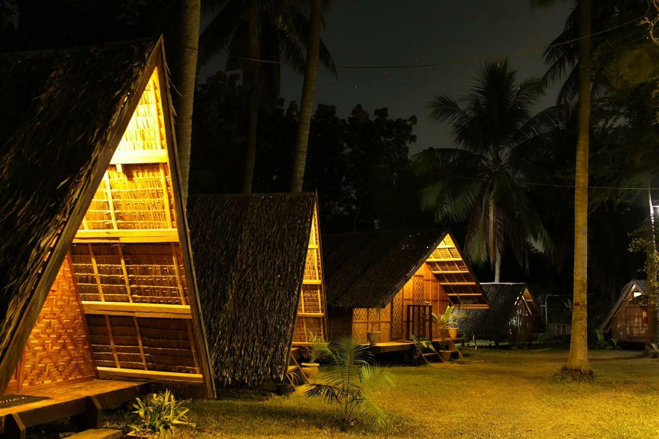 Hotel Archery-Asia Nipa Huts Moalboal Exterior foto